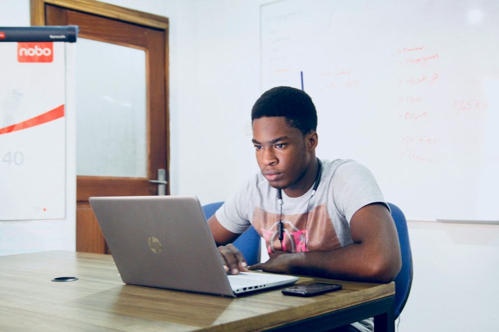 A student studying on a laptop